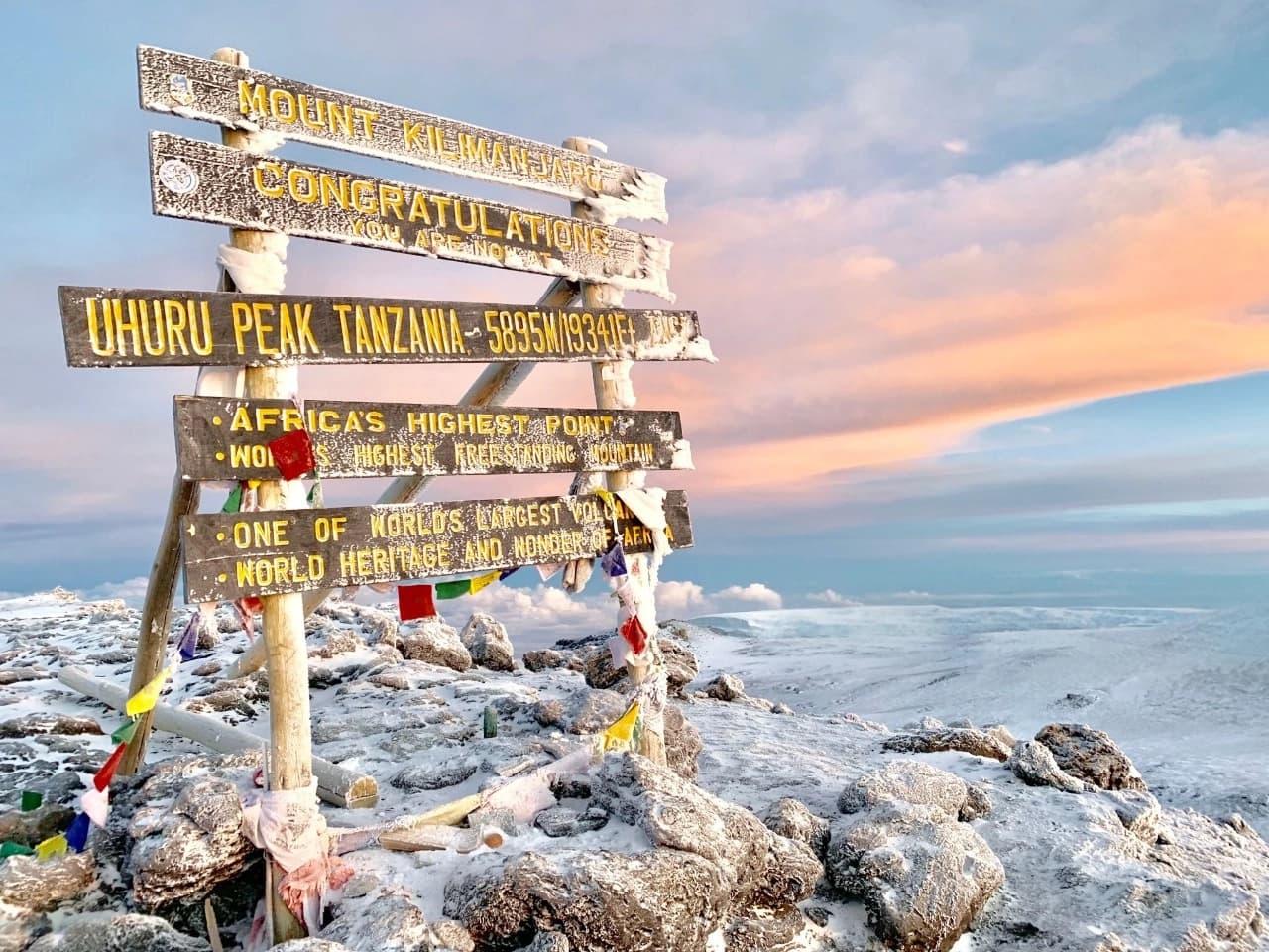 Mount Kilimanjaro, uhuru peak snow capped peak rising above African plains