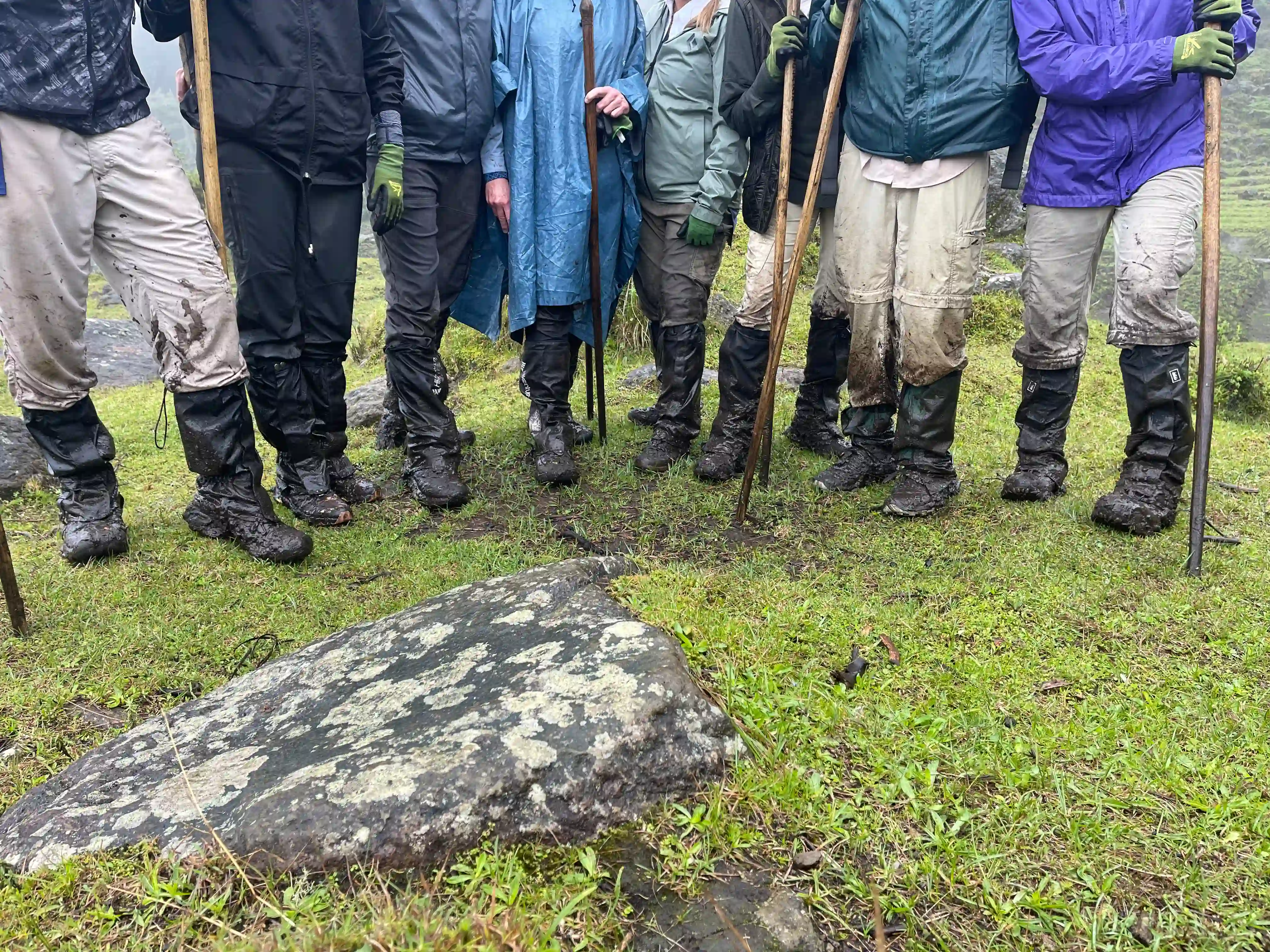 Travelers showing hiking boots after gorilla trekking – essential gear guide for What to Pack for Gorilla Trekking: Updated Essential List.