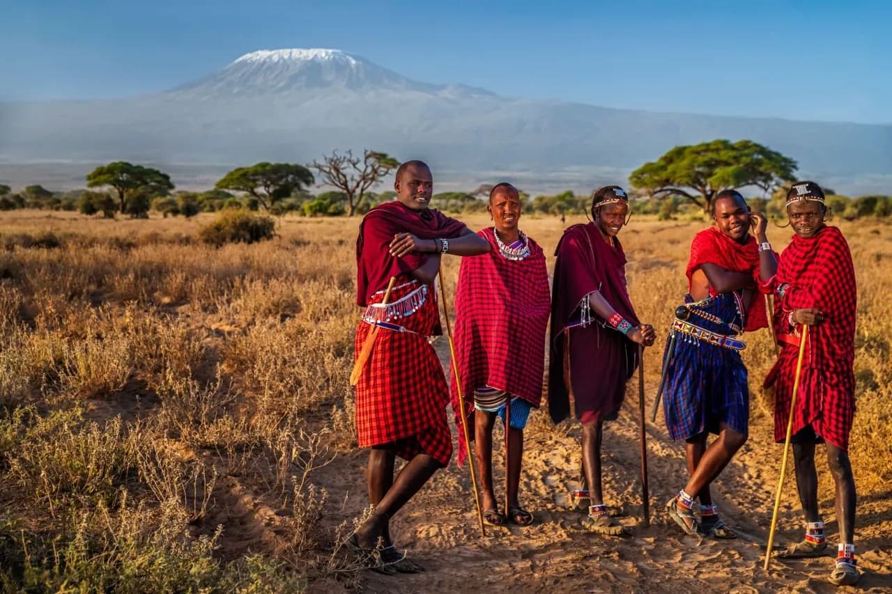 Maasai warriors standing proudly in traditional attire, showcasing Kenya's rich cultural heritage
