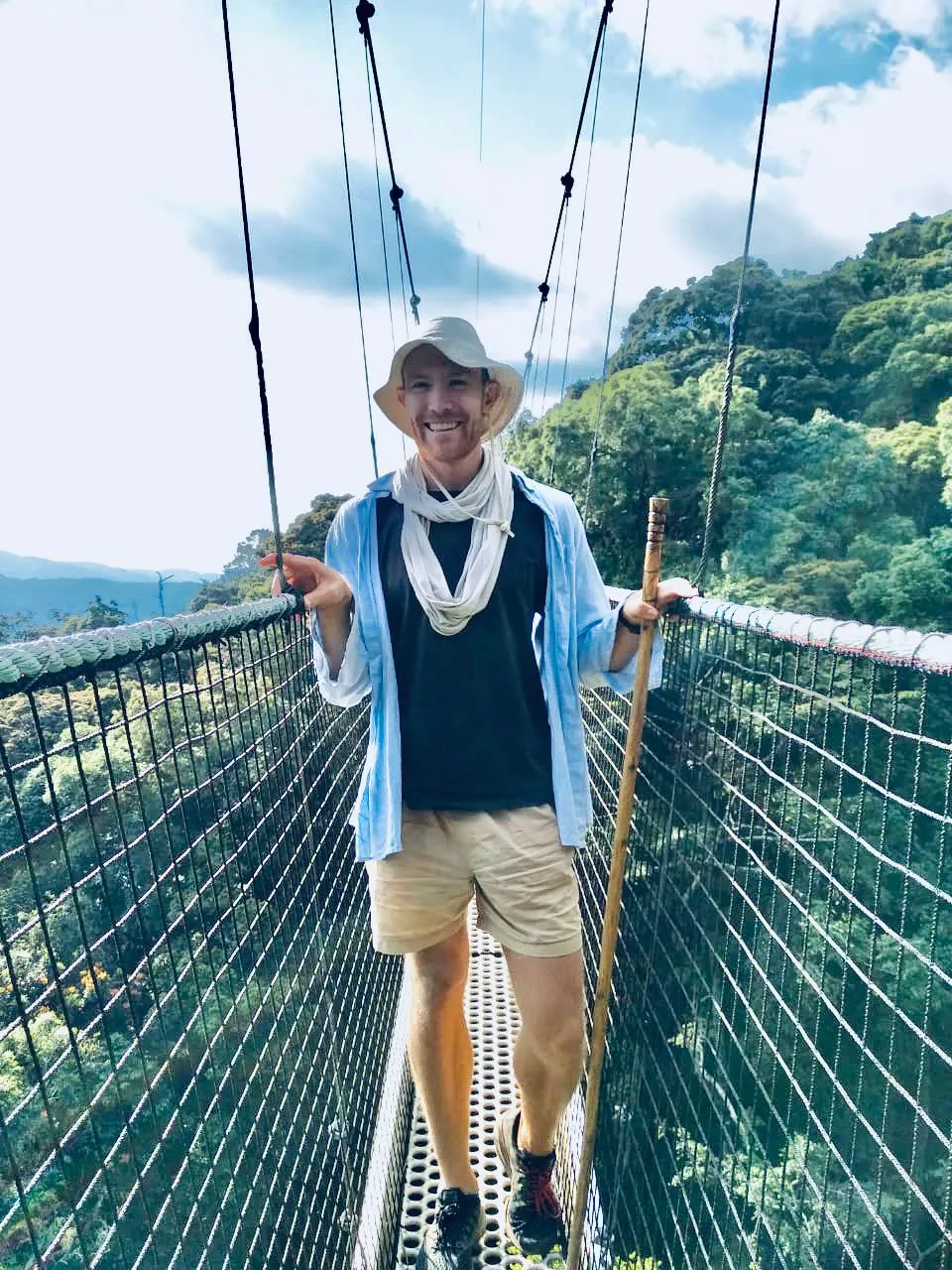 A solo traveler doing canopy walk in Nyungwe National Park