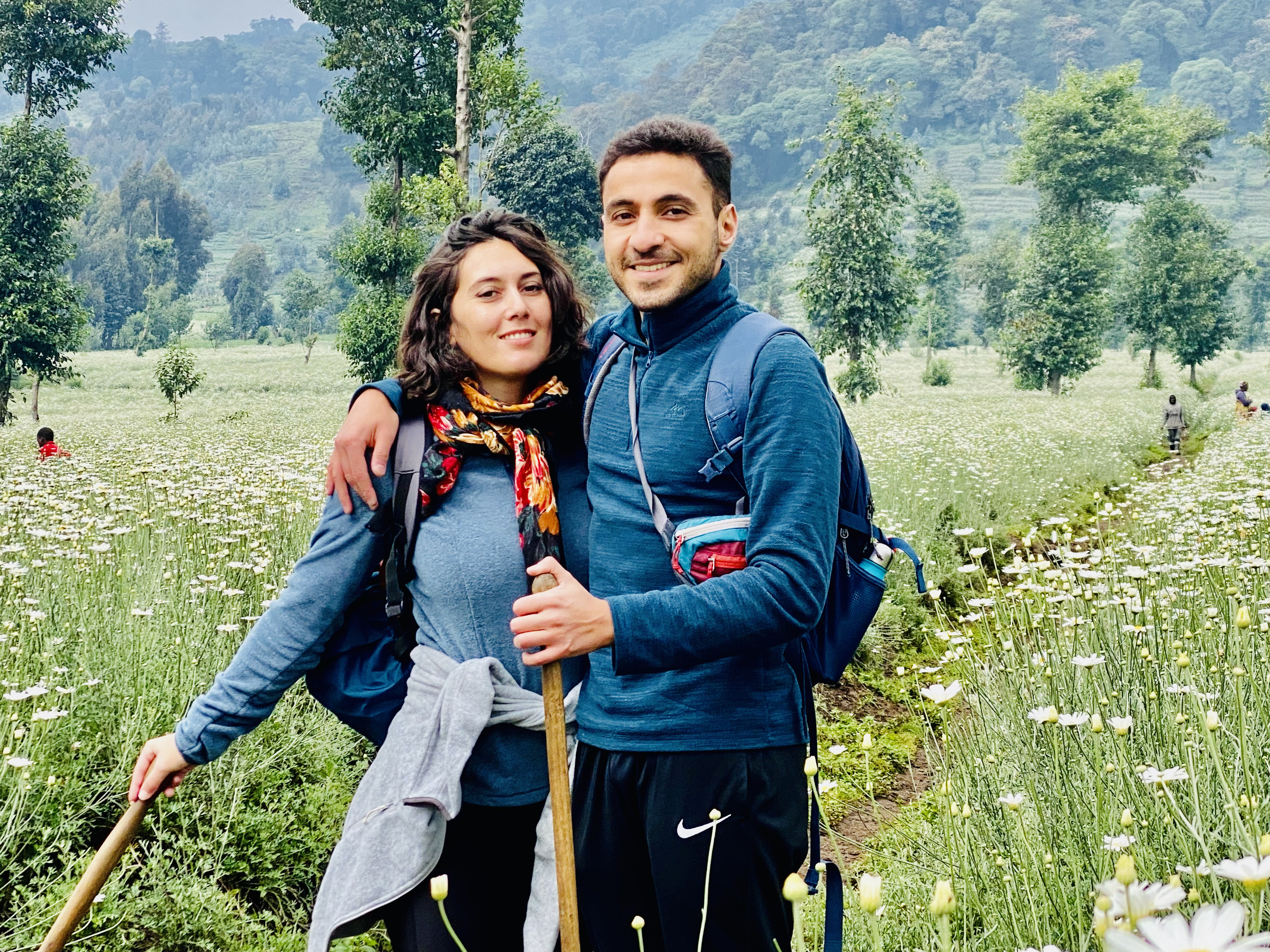 The lovers enjoying their honey moon in the nature of pyrethrum